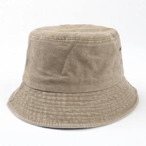 Detailed view of the washed khaki cotton fabric and stitching on a wide brim bucket hat
