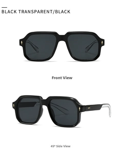 Detail of black frame sunglasses with golden diamond rivets and grey lenses