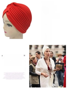 Detail view of red and white pleated turbans featuring high-elasticity warm fabric