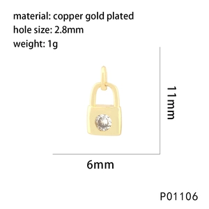 Macro shot of 18K gold plated heart lock pendant with zircons for jewelry DIY