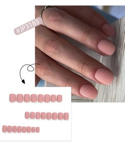 Matte nude pink press on nails in short square shape shown on hand and laid flat