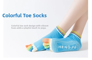 Detailed view of colorful non-slip yoga socks with five-toe design and grip dots