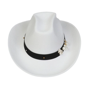 Close-up of white wool western cowboy hat featuring elegant black ribbon and pearl bead accents