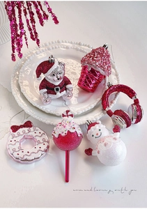 Pink and white glitter Christmas ornaments set featuring bear and cupcake shapes