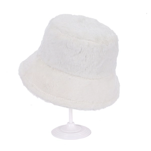 Close-up of soft white fleece texture on a warm winter bucket hat for women