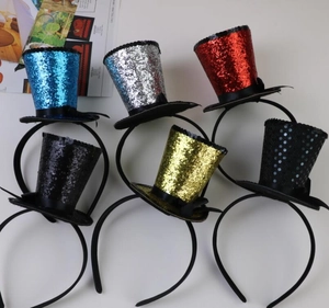 Detail of colorful sequined mini witch hat headbands for party and festival decorations
