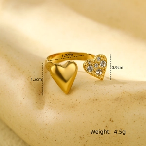 Macro shot showing dimensions of gold heart ring with crystal inlay, 1.7cm inner diameter