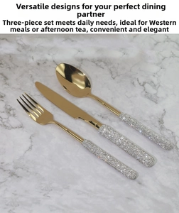 Close-up of luxury 304 stainless steel gold cutlery set with crystal-encrusted handles