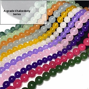 Detailed close-up of colorful round natural stone beads for DIY jewelry making