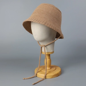 Lightweight breathable knitted bucket hat with wavy brim and stylish tie strap for women