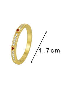 Detail view of 1.7 cm gold ring with red hearts and micro-set white zircon stones