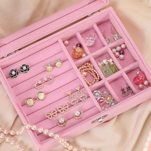 Pink velvet jewelry box with transparent lid featuring multi-compartment storage space