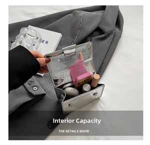 Silver crocodile texture mini bag interior capacity showing lipstick and small items