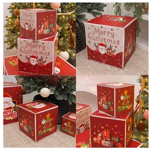 Detail view of decorative Christmas gift boxes with Santa and reindeer patterns