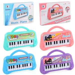 Piano electrónico portátil de 22 teclas para niños con asa en cuatro colores pastel