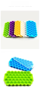 Detail of 37-cell honeycomb silicone ice trays with lids in five vibrant colors