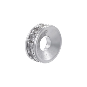 Macro shot of silver plated copper wheel bead with sparkling white cubic zirconia