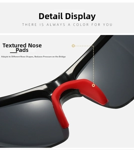 Detail of red silicone nose pads on black sports sunglasses for ergonomic cycling comfort