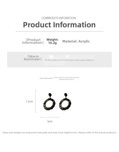 Detail view of deep green acrylic geometric drop earrings with silver needle and dimensions