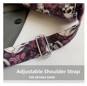 Macro shot of adjustable silver buckle on nylon tote with skull and rose print