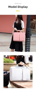 Business style waterproof laptop bag featuring dual front pockets and durable metal hooks