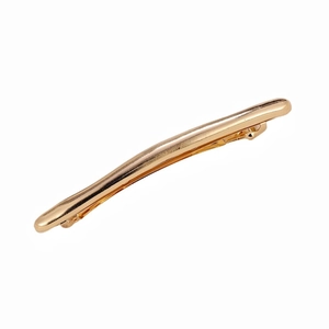 Sleek gold metal long curved hair clip with high-shine finish and spring closure