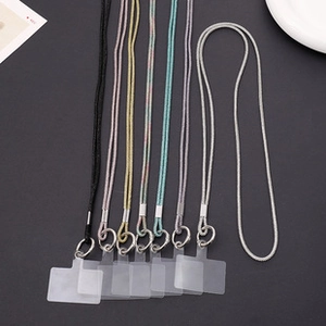 Detailed view of colorful beaded phone lanyards with silver rings and clear gaskets