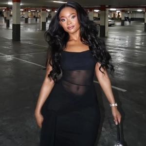 Slim fit black sleeveless maxi dress featuring sheer mesh waist cutout detail for street style