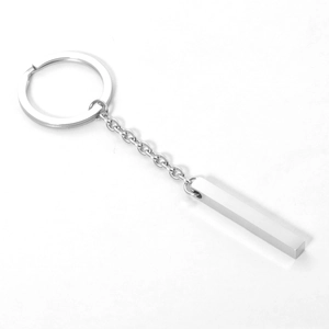 Minimalist silver mirror stainless steel bar keychain with rectangular pendant on white backdrop
