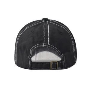 Detail of adjustable metal buckle and contrast stitching on vintage cotton ponytail cap