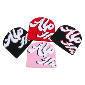 Cozy winter knit beanie hats with jacquard letters in black, red and pink colors