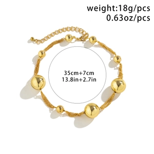 Detail of chunky golden faux pearl choker with size 35cm plus 7cm and weight 18g
