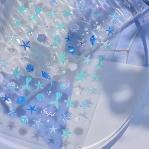 Stickers à ongles 3D thème océan avec étoiles de mer et coquillages irisés bleu glacé