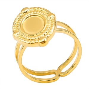 Detailed close-up of a double-band gold ring featuring a vintage sunburst relief texture