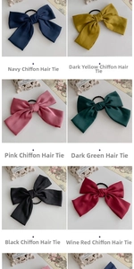 Macro detail of oversized chiffon bow hair clips in six vintage colors and plaid patterns