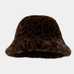 Close-up of fluffy faux fur bucket hat with detailed brown leopard print texture