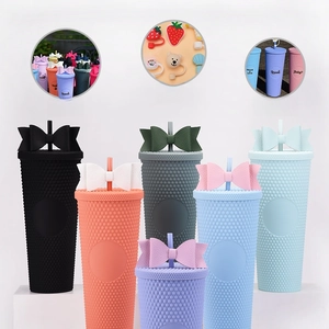 Detail of 710ml studded plastic tumbler set with bow decoration and DIY stickers