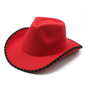 Classic red felt western cowboy hat with black braided trim on a curved brim for outdoors