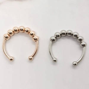Anillos antiestrés con cuentas giratorias en plata y oro rosa, diseño abierto ajustable