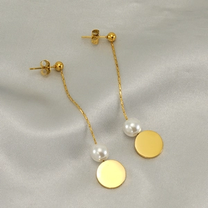 Elegant gold-tone long drop earrings with pearl bead and round disc on silk fabric