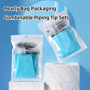 Stainless steel piping nozzle set with blue pastry bag in pearl bag packaging