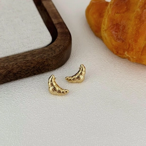 Minimalist 925 silver croissant earrings in gold finish with polished metallic luster