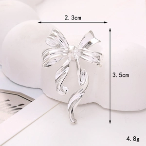 Silver zinc alloy bow accessory showing detailed dimensions of 2.3cm by 3.5cm