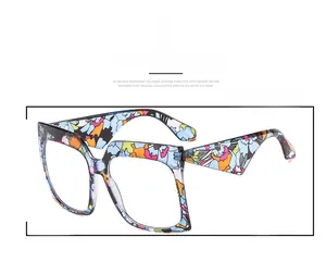 Macro view of colorful floral pattern on oversized butterfly style eyewear frames