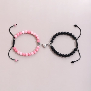 Magnetic couples bracelets with pink howlite, black matte beads and silver heart charm