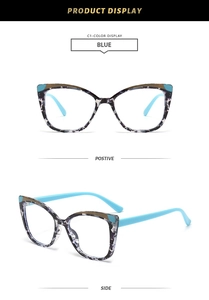 Detail view of cat eye glasses frame in blue marble acetate on a white background