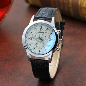 Close-up of Ganwa quartz chronograph watch with silver case and blue light glass reflection