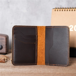 Handmade crazy horse leather card holder in dark brown with multiple slots and vintage design
