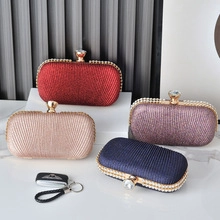 Elegant clutch bags with glitter fabric and rhinestone edges in multiple colors