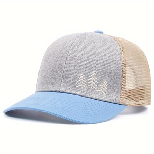 Detail showing embroidered pine trees on mesh trucker hat with blue brim and grey front